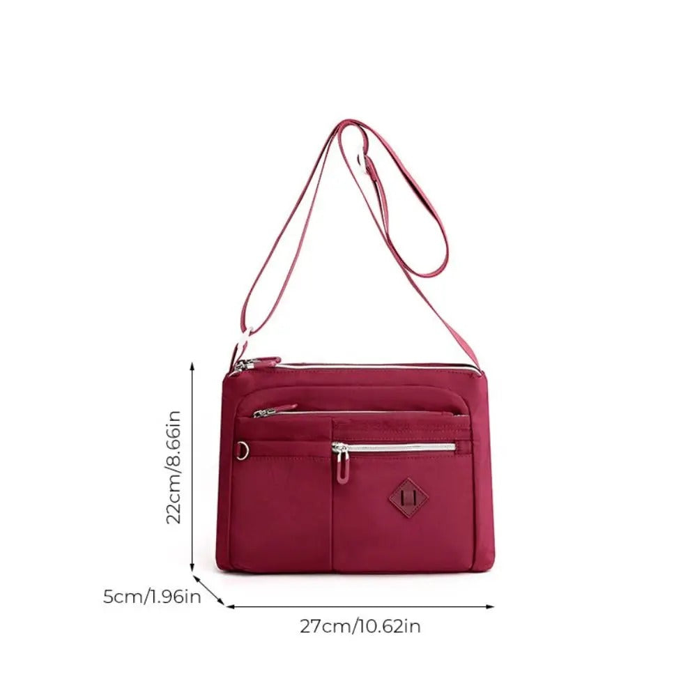 Eleganza™ - Cartera de mano multifuncional